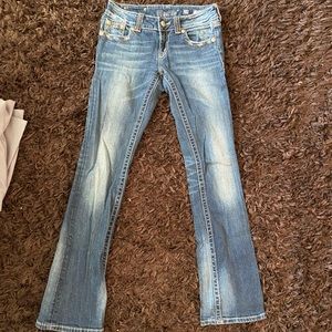 Orange stitching miss me designer jeans